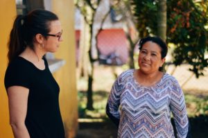 Tew speaking with Nicaraguan woman